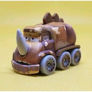 Disney/Pixar/Matell/Die-cast/Cars Mini Racers Dino Quadratorquesar  In Egg #5...